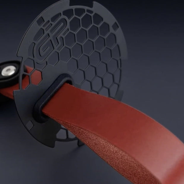 MINI Cooper R56 door panel showing motorsport-style red handle pull RS strap.