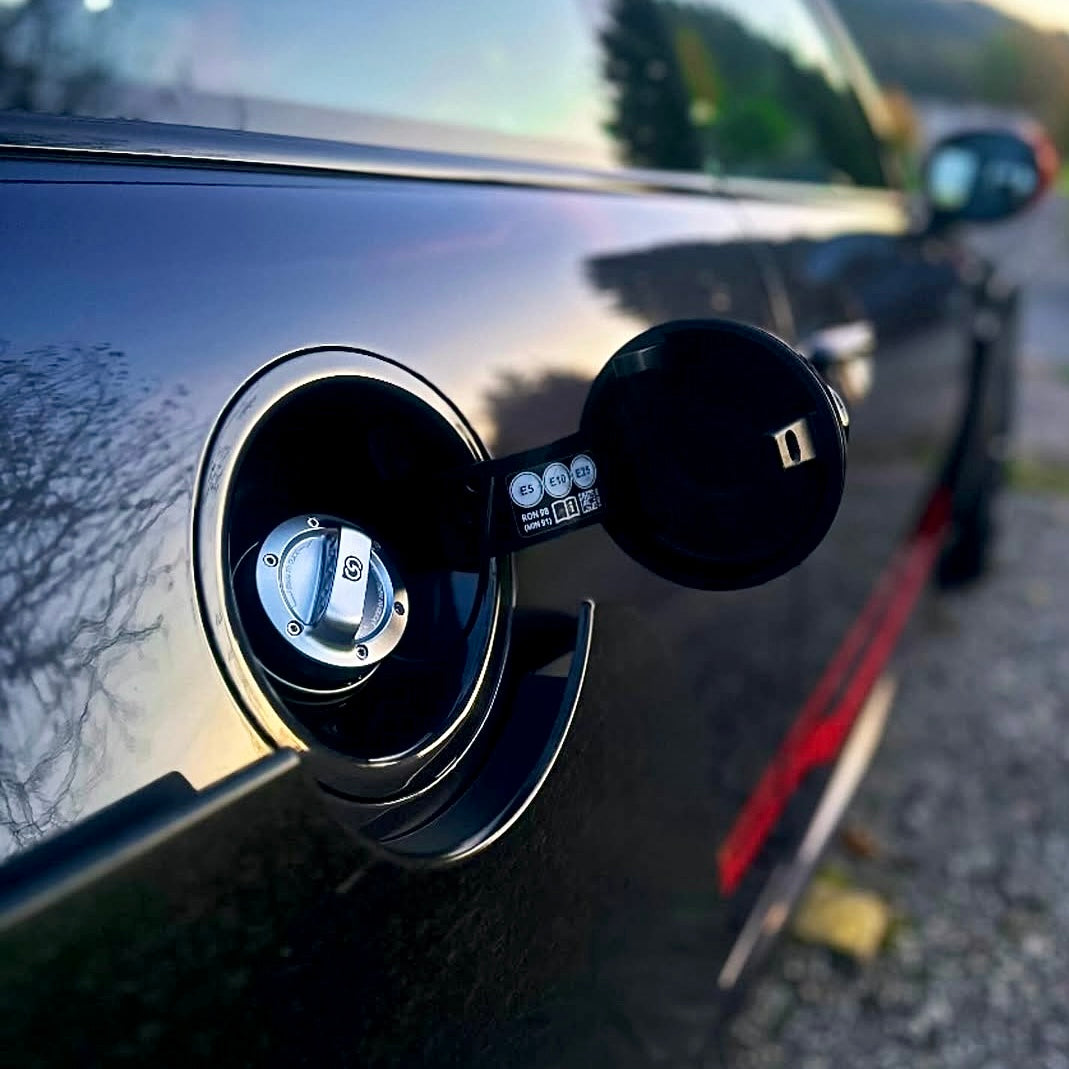 Close-up of the OneMiniBite CNC aluminum fuel cap installed on a MINI Cooper F56 GP3, showing precision-machined detailing and anodized finish. Featured in OneMiniBite customer review.