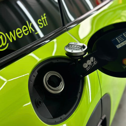 Side-by-side view of OneMiniBite Mini Cooper fuel cap on F54 Clubman, showcasing high-quality craftsmanship, anodized finish, and customer-fitted results from OneMiniBite reviews.