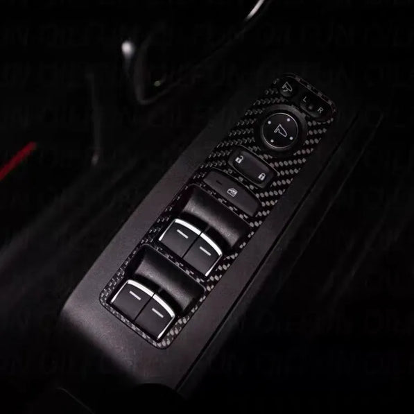 Complete set of real carbon fiber overlays for 2022+ Honda Civic FE and Sport models. Includes window switches, center console, and USB port covers.