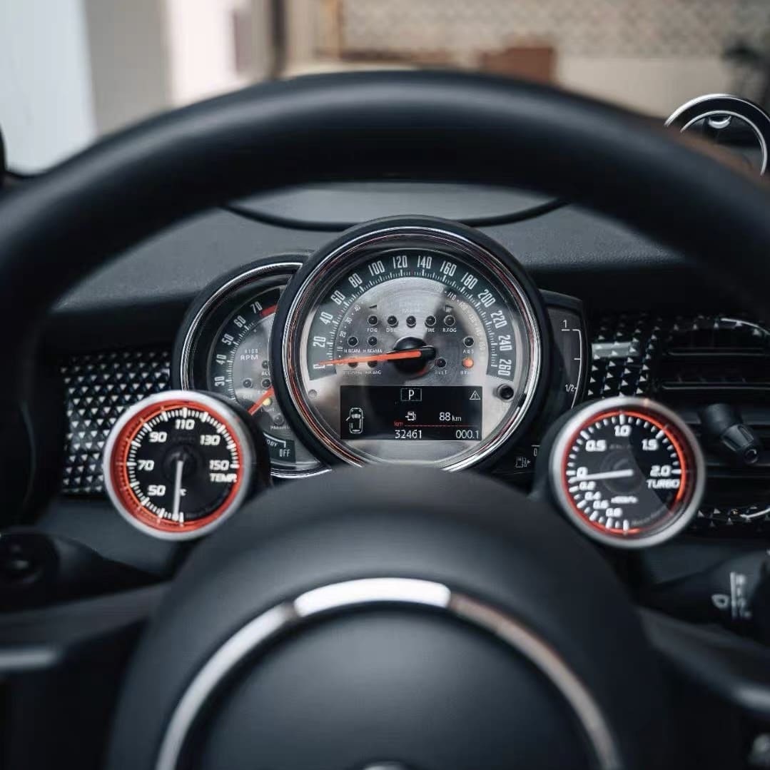 Installed retro racing glow gauge cluster from our aftermarket custom MINI Cooper parts collection for F-Series dashboards.