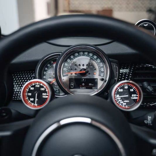 Installed retro racing glow gauge cluster from our aftermarket custom MINI Cooper parts collection for F-Series dashboards.