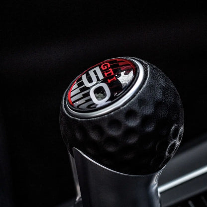 Close-up of VW Golf GTI MK8 gear knob extension installed with sport interior styling