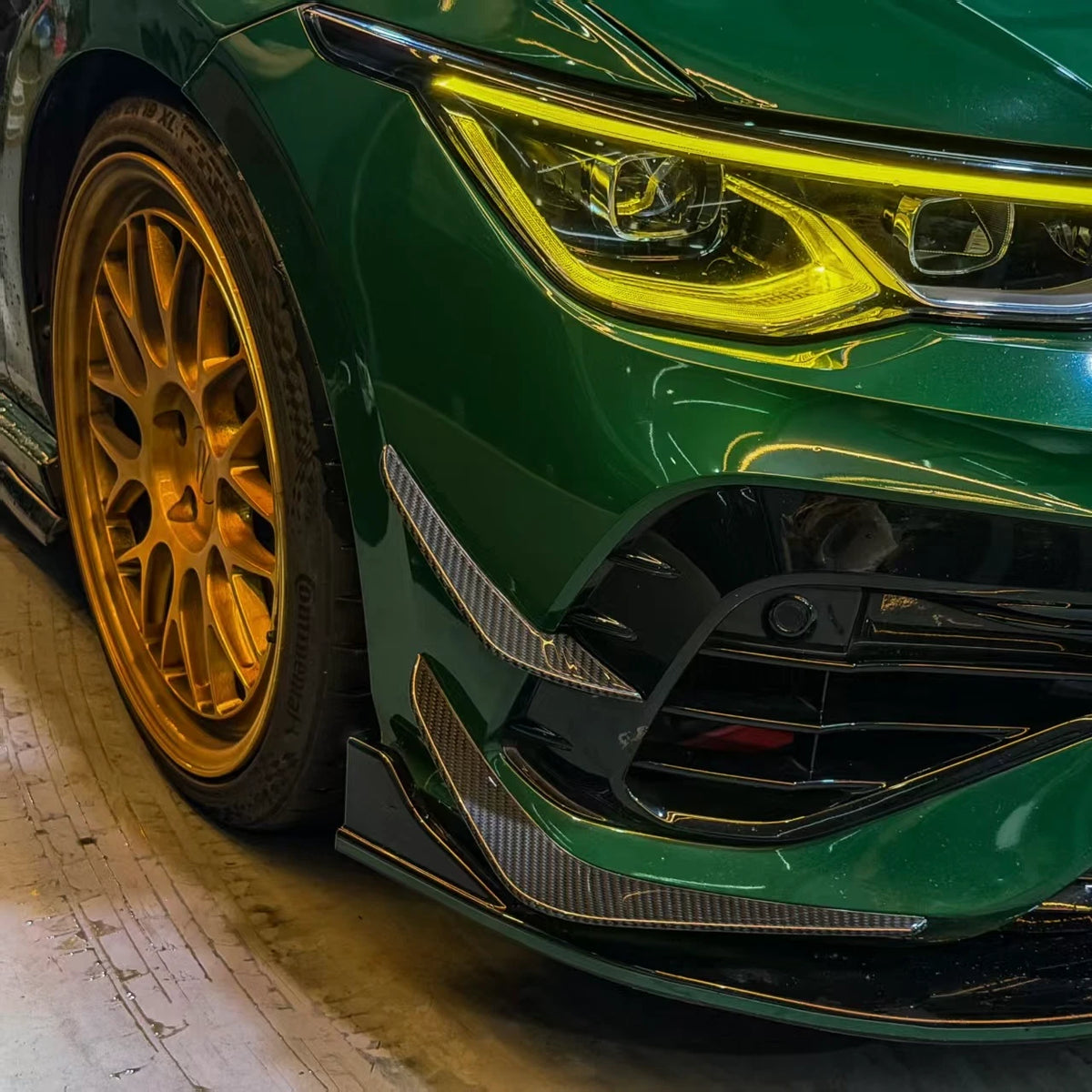 VW Golf MK8 R carbon fiber front canards installed, side angle view