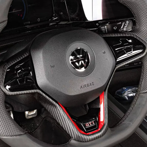 Matte carbon fiber trim for VW Golf MK8, GTI, and R steering wheels, factory-fit precision, direct replacement with no modification required.