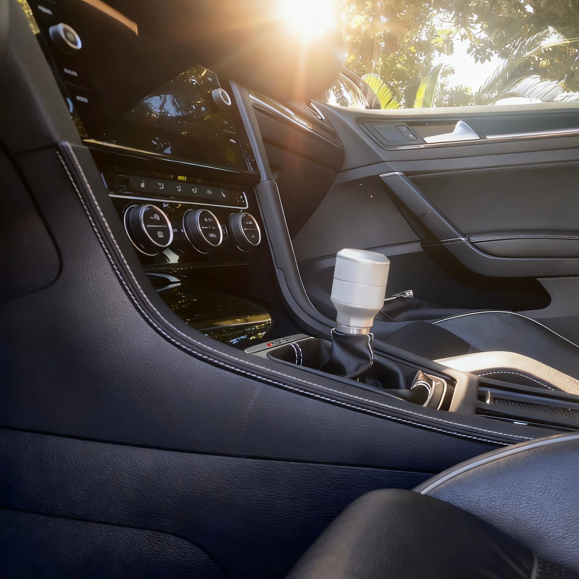 Close-up of VW Golf R MK7 / MK7.5 gear shift panel cover in Alcantara, showing precision stitching and OEM-quality fit.