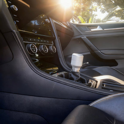 Close-up of VW Golf R MK7 / MK7.5 gear shift panel cover in Alcantara, showing precision stitching and OEM-quality fit.