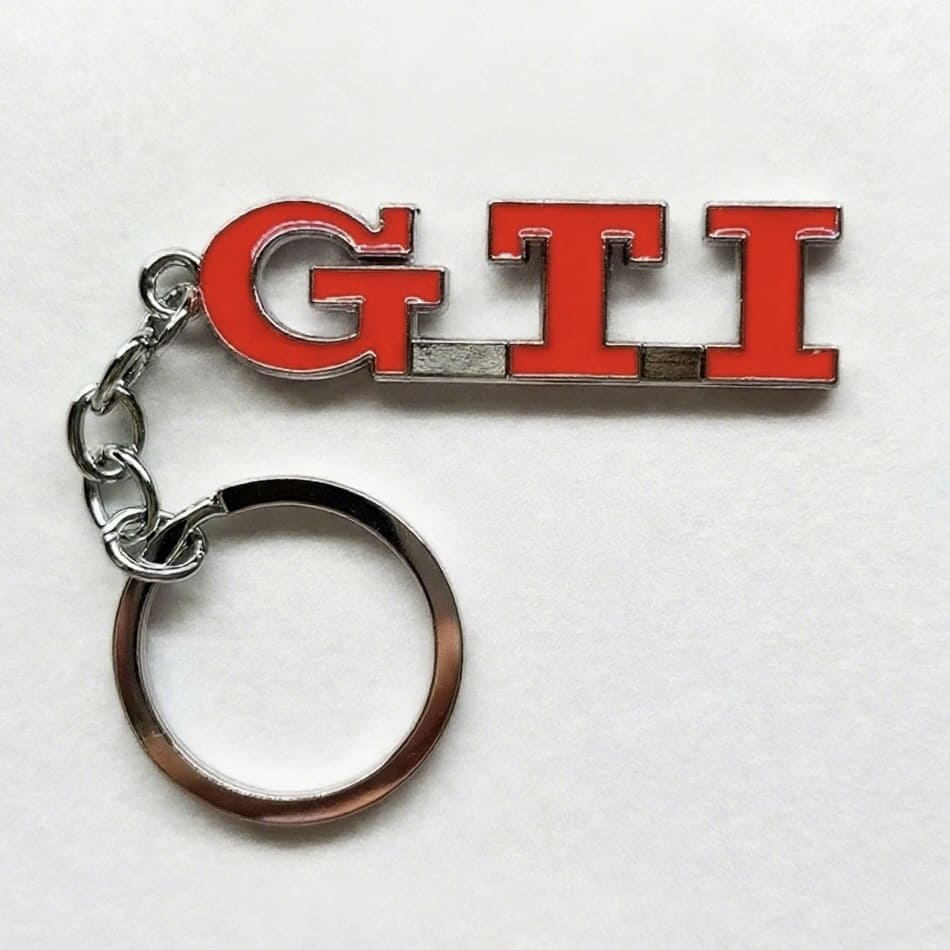 Volkswagen GTI badge keychain featuring a polished metallic design, ideal for GTI owners and VW fans.