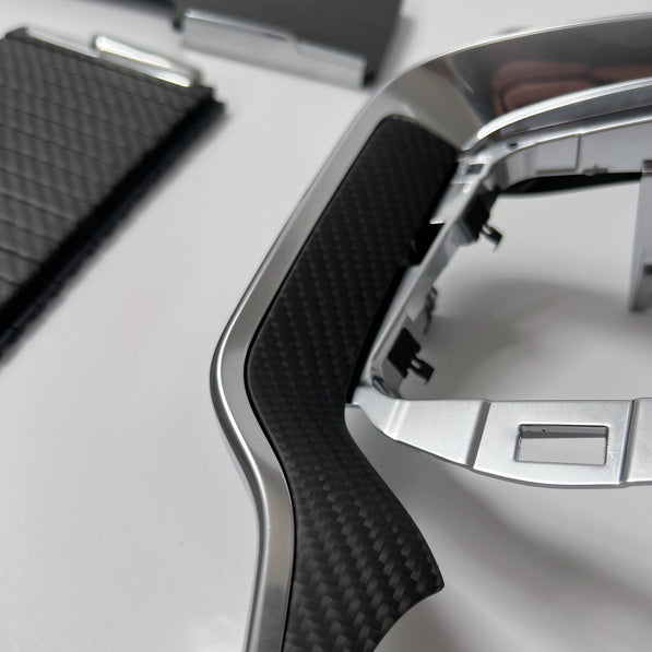Volvo S60 V60 left air vent dash trim in matte black carbon fiber — SPA platform 2019 to present