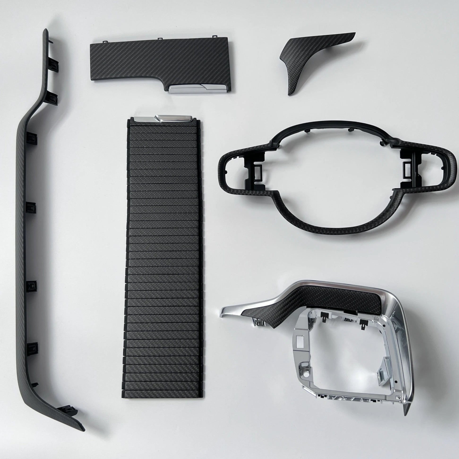 Volvo S60 V60 full carbon fiber interior trim set in matte black — steering wheel trim, dash console 3-piece and sliding lid cover