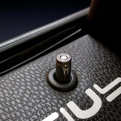 Bullet-inspired metal door lock pin – custom aftermarket part for MINI Cooper R-Series interiors