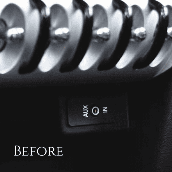 MINI Cooper dashboard showing only AUX input before Bluetooth and USB upgrade