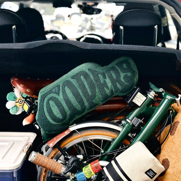 MINI Cooper shaped cushion placed in car interior seat