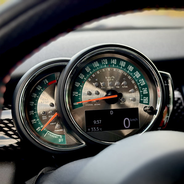ustom sunburst gauge face installed in MINI Cooper F56 JCW – retro metal dial cluster upgrade with orange backlight compatibility