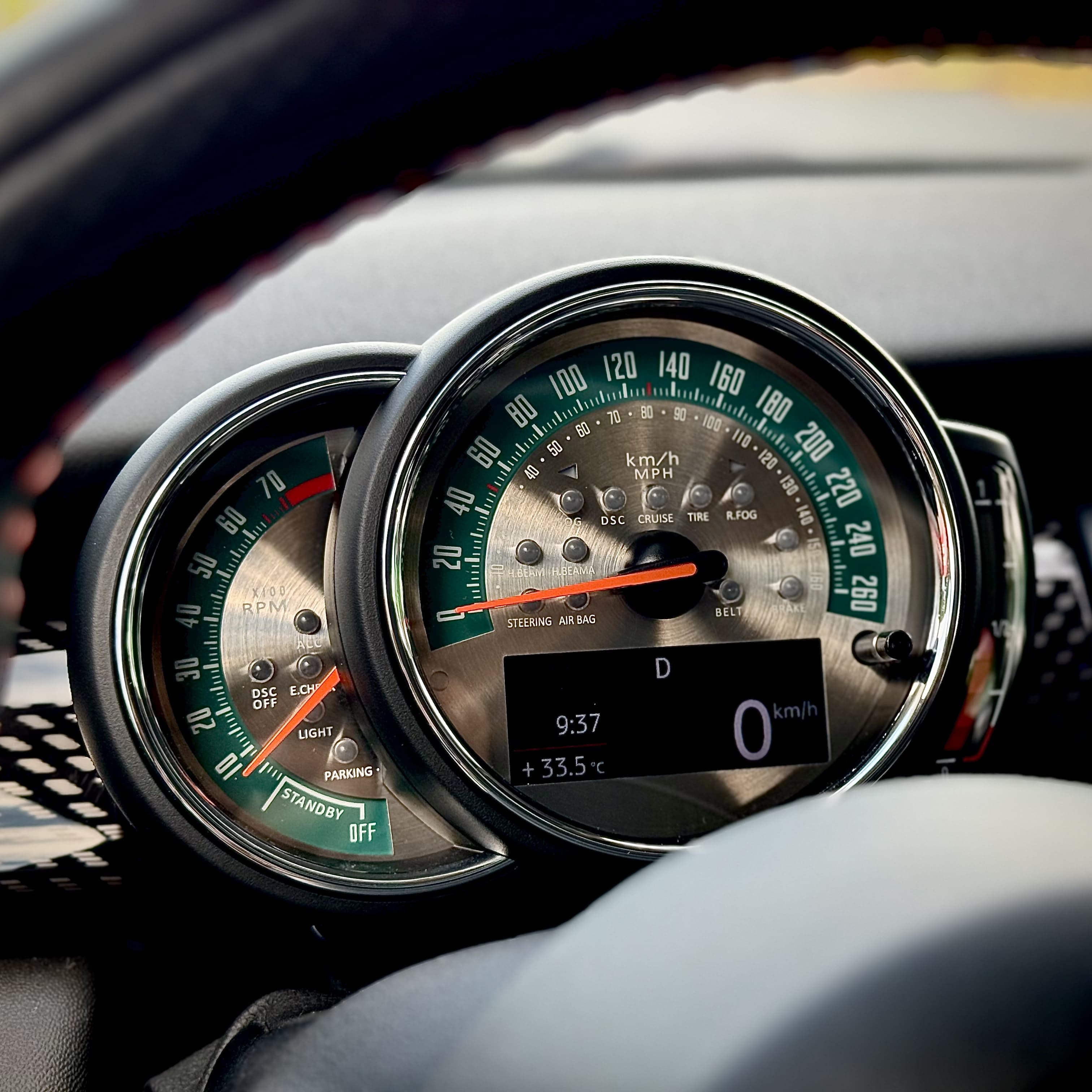 ustom sunburst gauge face installed in MINI Cooper F56 JCW – retro metal dial cluster upgrade with orange backlight compatibility