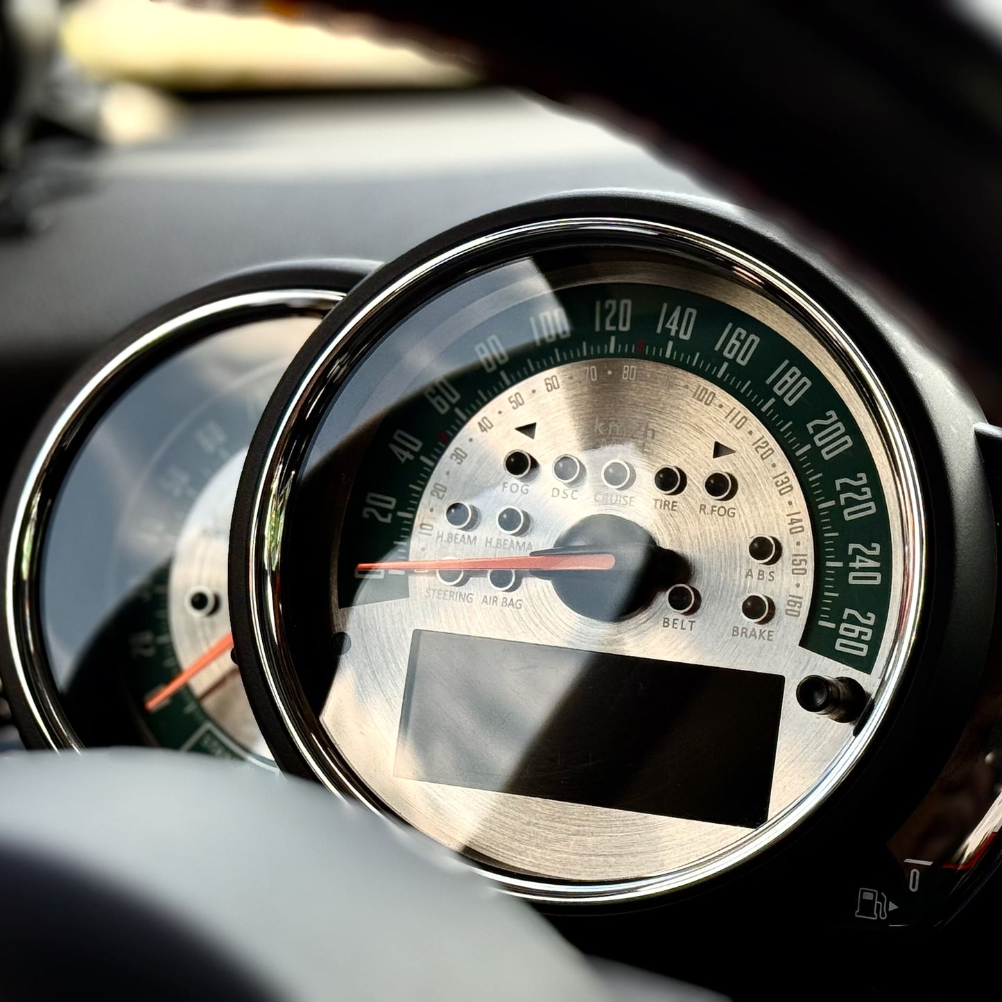 Sunburst metal gauge overlay installed in MINI Cooper F60 Countryman – precision-fit cluster dial for Gen 3 MINI interior