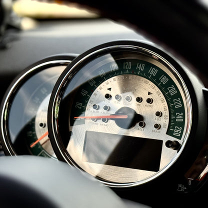 Sunburst metal gauge overlay installed in MINI Cooper F60 Countryman – precision-fit cluster dial for Gen 3 MINI interior
