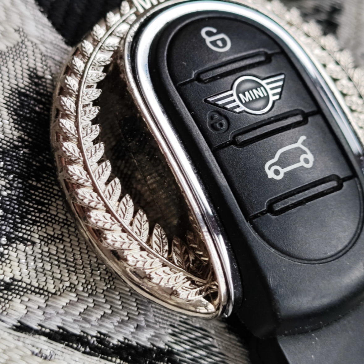 Installed alloy keyfob shell keychain in a Mini Cooper, illustrating the elegant design and seamless fit