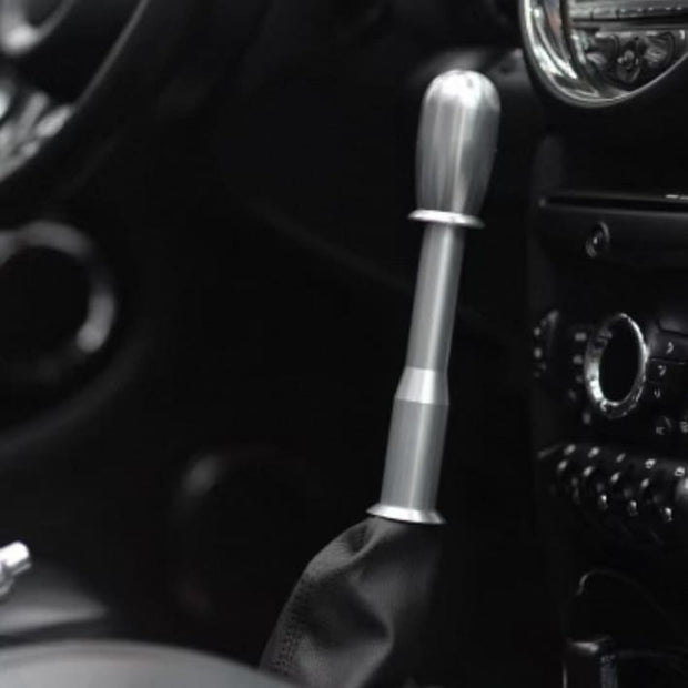 Installed view of shifter extension kit in MINI Cooper R-Series interior — performance-focused upgrade