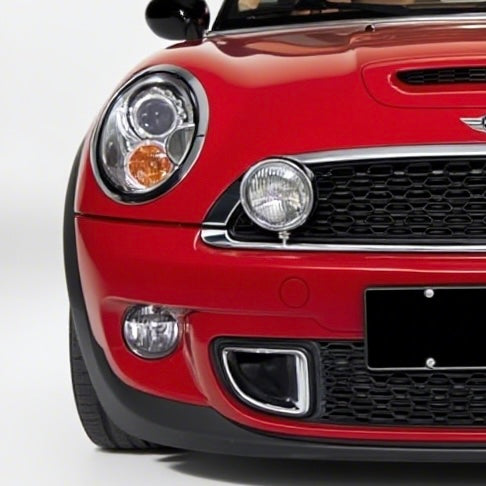 Front view of MINI Cooper R56 with aftermarket rally light bracket kit installed—fits R55, R56, and R57 models using factory screw points.