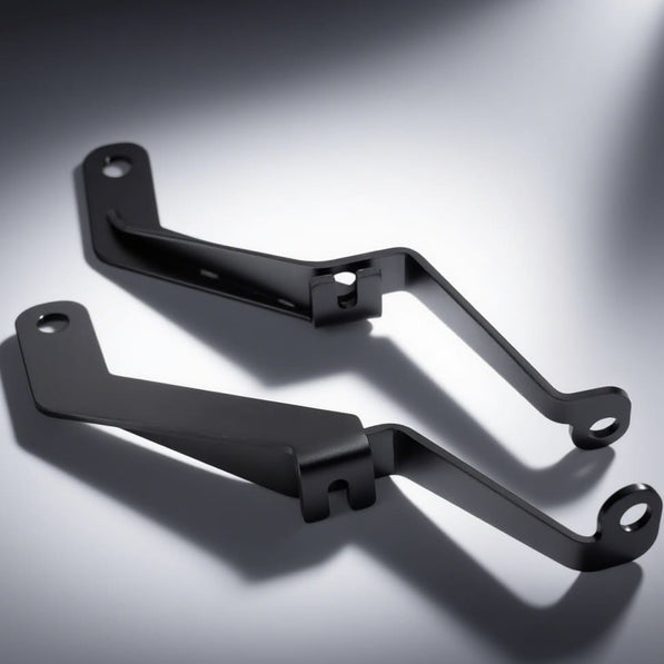 Angled view of matte black MINI Cooper rally light bracket – custom aftermarket part.