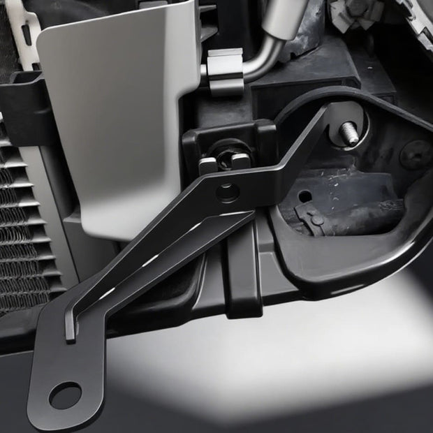 Right-side close-up of MINI Cooper S R56 rally light bracket for aftermarket driving lights