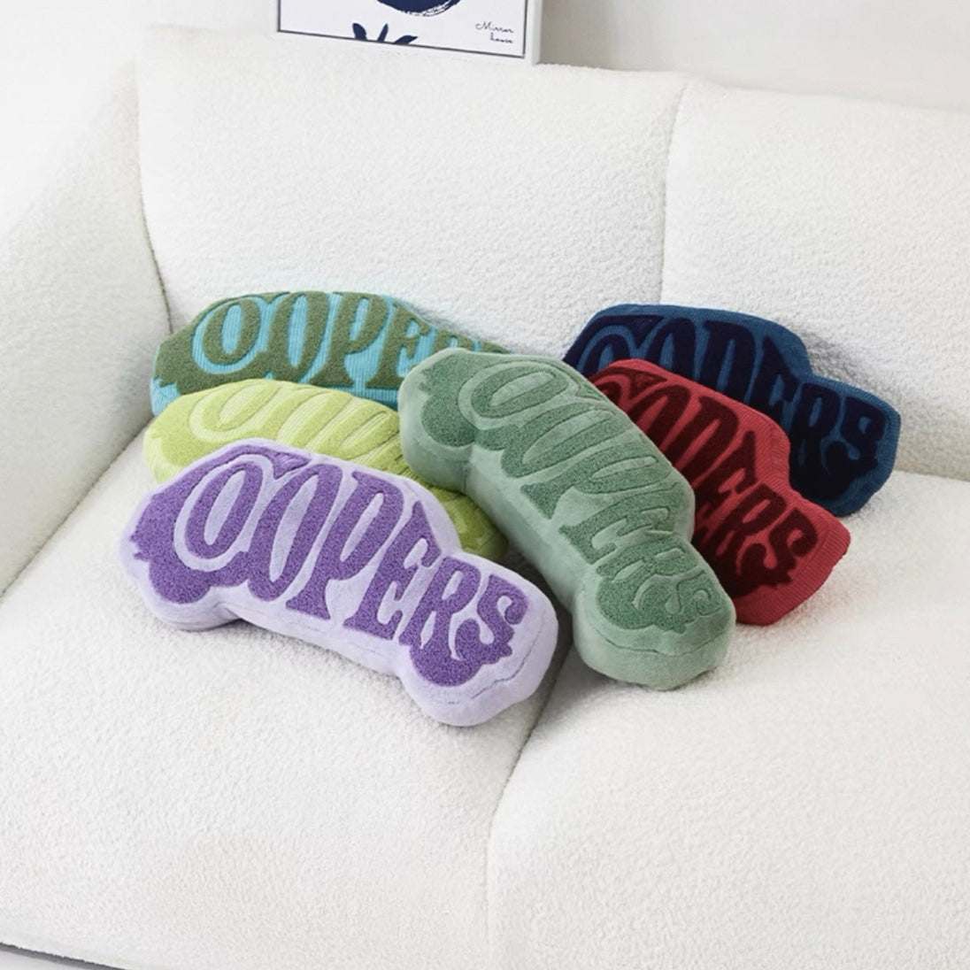 MINI Cooper shaped cushion used as home decor on a couch