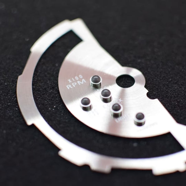 Detailed view of tachometer and speedometer sunburst dial upgrade for MINI Cooper F-Series