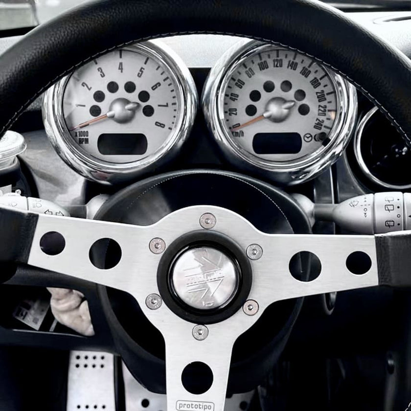 Steering hub adaptor for MINI R52 shown installed from driver’s side angle

