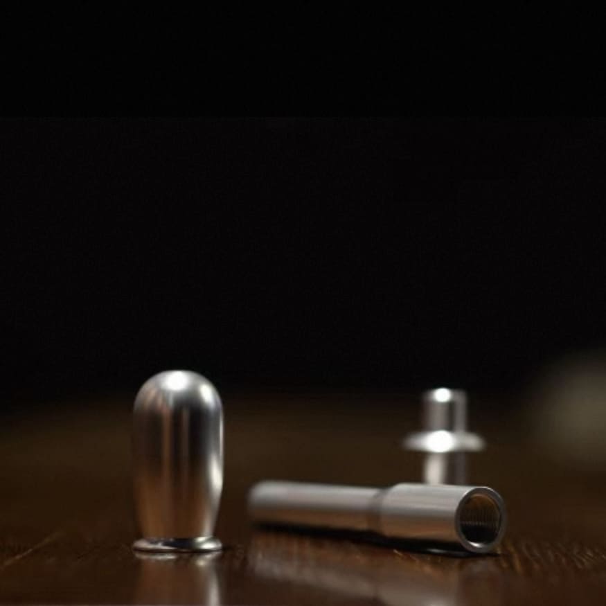 Close-up of CNC-machined aluminum shifter extension for MINI Cooper R50, R53, R56, and R60