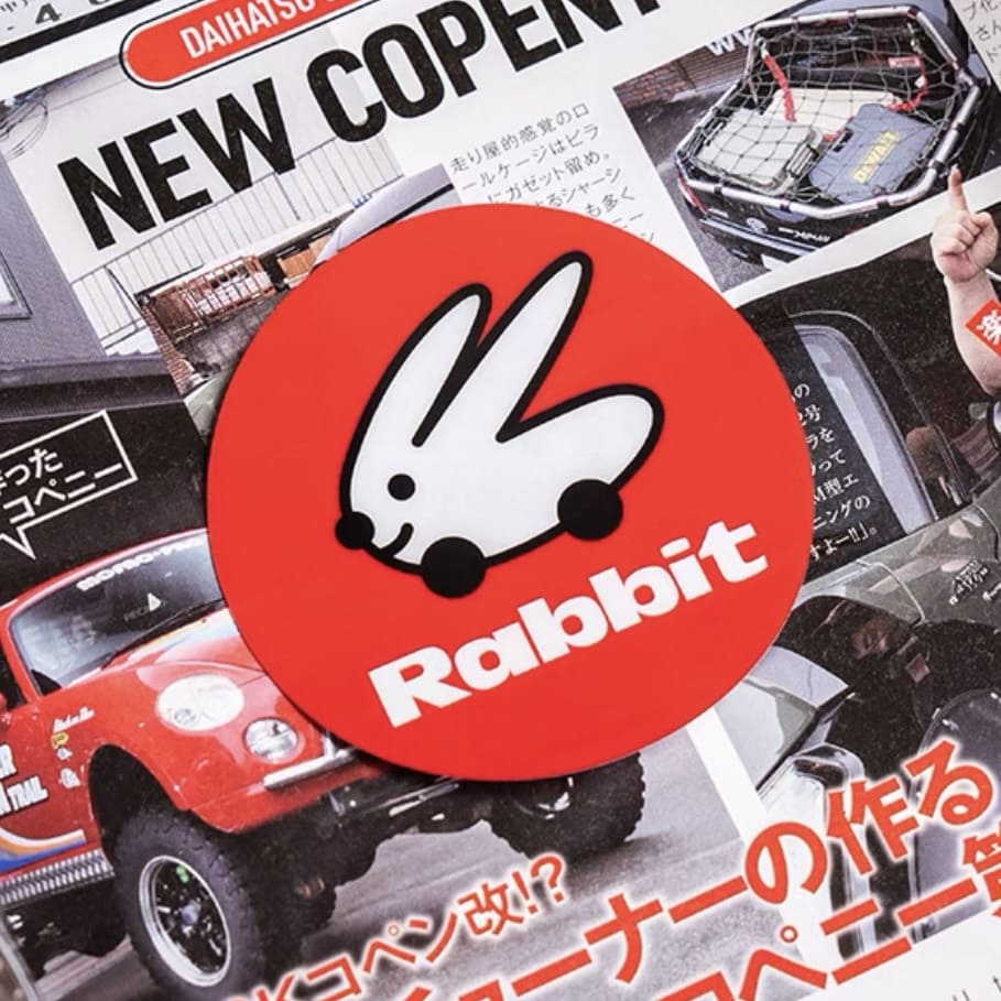 Close-up of round red rabbit static cling sticker for VW Golf, GTI, and Golf R