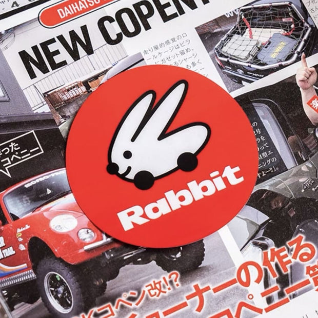 Close-up of round red rabbit static cling sticker for VW Golf, GTI, and Golf R