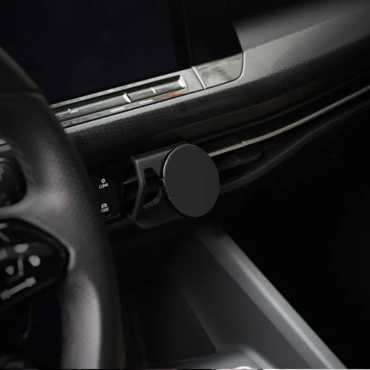 Golf MK8 MagSafe phone mount installed on VW dashboard – no vent blocking