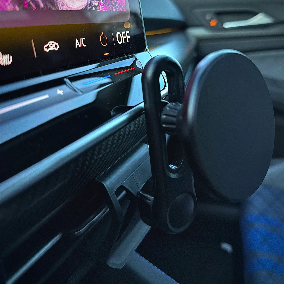 VW Golf MK8 phone mount with extended arm and MagSafe magnetic holder, side view