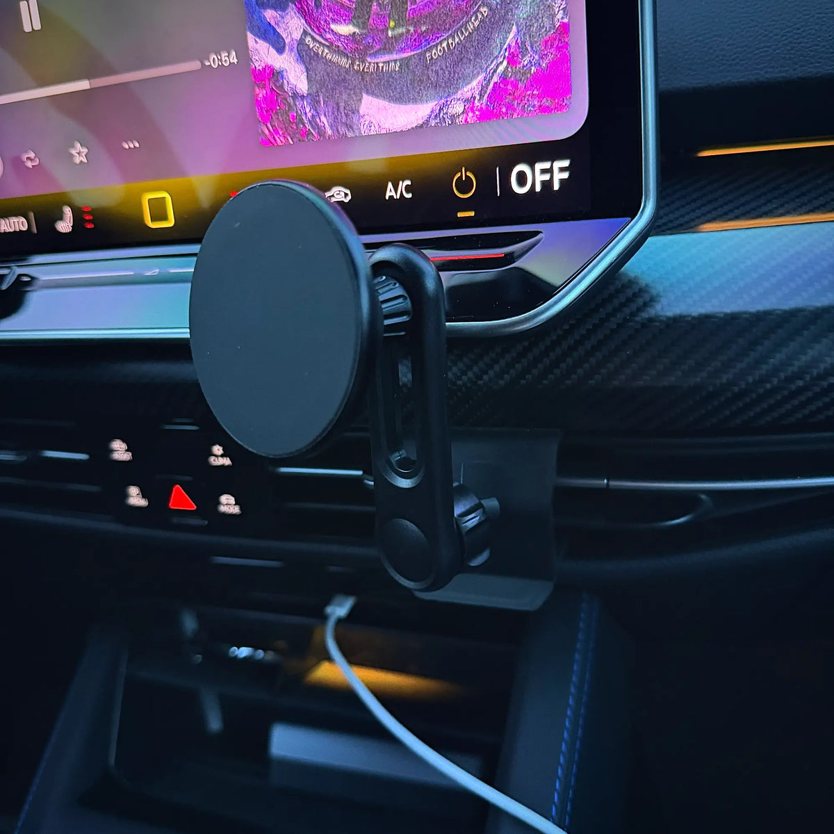 Golf MK8.5 MagSafe phone holder on adjustable extended arm, positioned clear of the screen